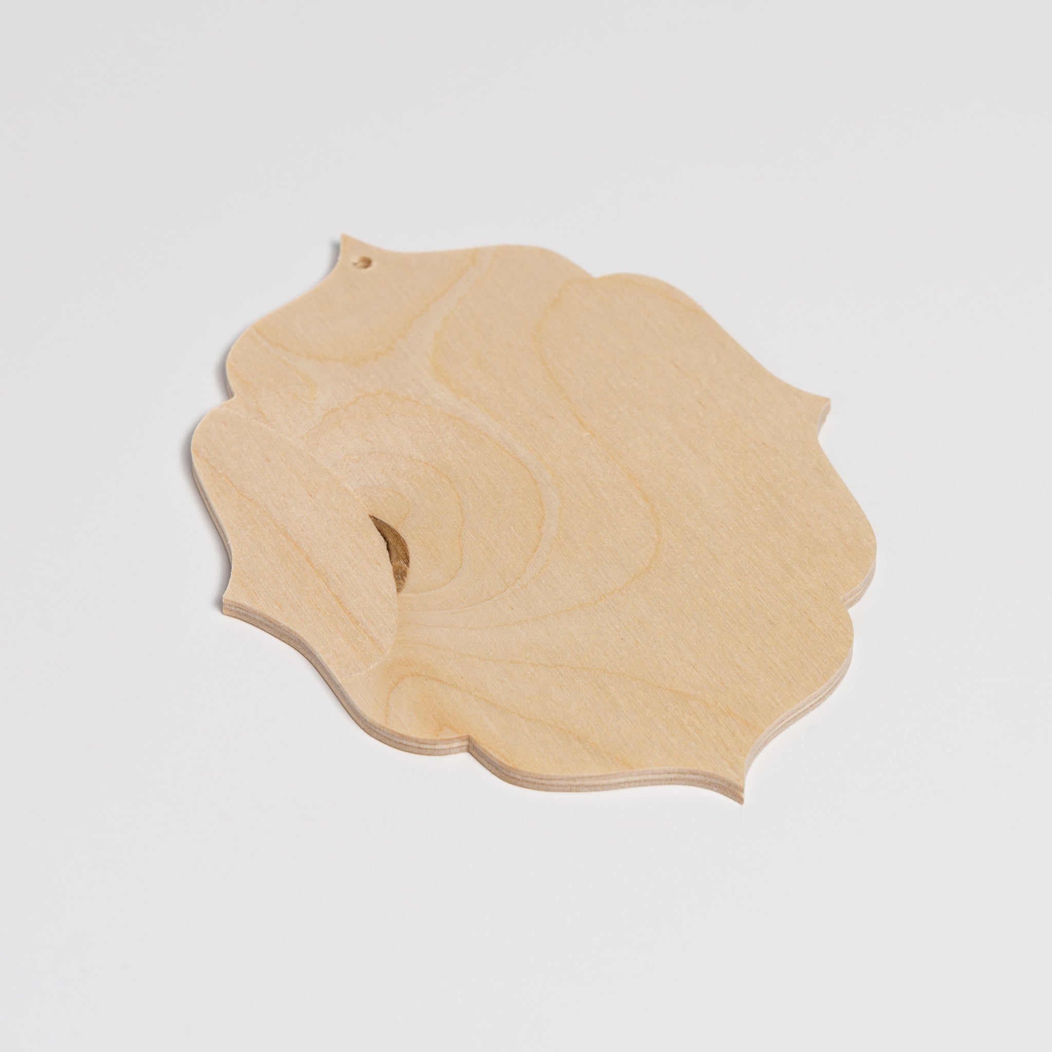 Oval Wooden Ornament with Scalloped Edge